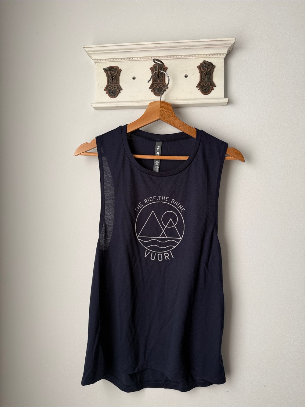 Vuori The Rise and Shine Tank in Navy Graphic Muscle Tee with Mountain Logo